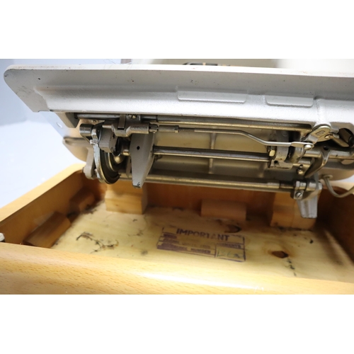 774 - Vintage Brother, Sew Tric, sewing machine, in case, motor runs but mechanism is stiff, requires serv... 