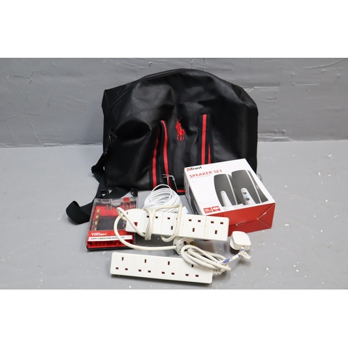 699 - A Ralph Lauren Bag of Various Electricals To Include Five Four Plug Extension Leads, Speaker Set, Dr... 