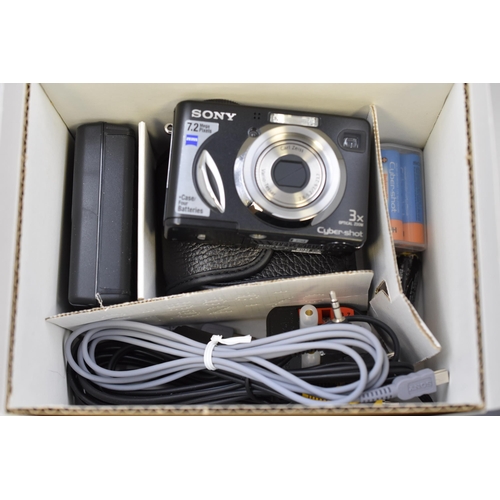 749 - Three Boxed Digital Cameras, And Video Camera. Includes Sony Cyber-Shot (Powers On), And More