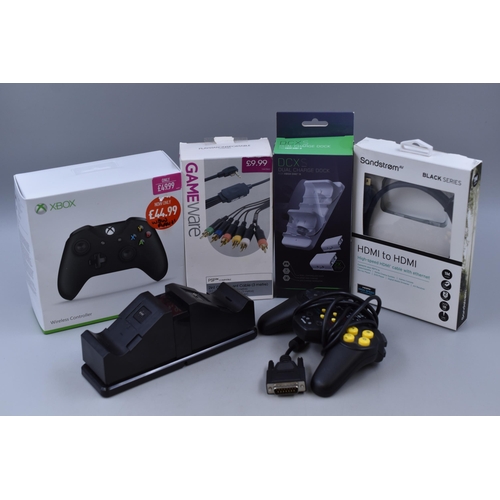 591 - A Selection of Gaming Accessories To Include Xbox One Controller, HDMI Cable, Charging Docks, And Mo... 