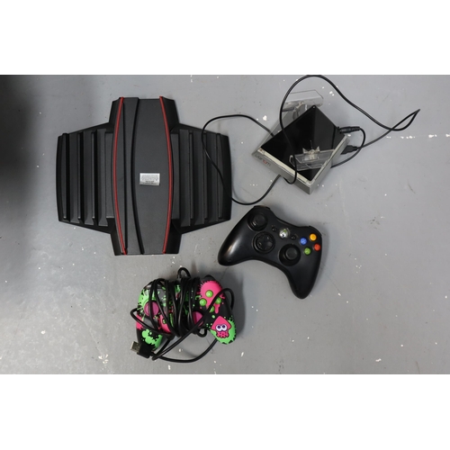 586 - Six Various Gaming Controllers and Charging Docks