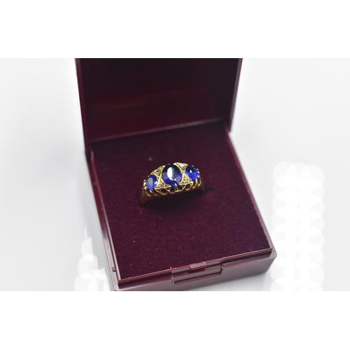 46 - A Hallmarked 18ct Birmingham Diamond and Sapphire Stoned Ring, Size M