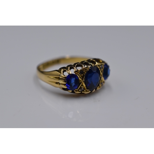 46 - A Hallmarked 18ct Birmingham Diamond and Sapphire Stoned Ring, Size M