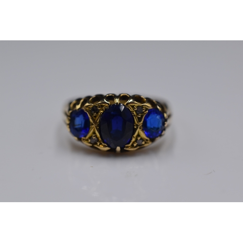 46 - A Hallmarked 18ct Birmingham Diamond and Sapphire Stoned Ring, Size M