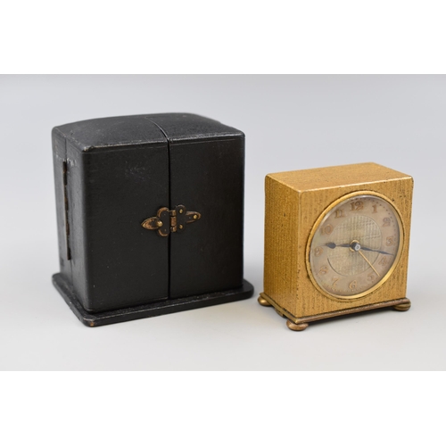 15 - A 1920's Art Deco Brass Cased Zenith Travel Alarm Clock, In Fitted Case. In Working Order