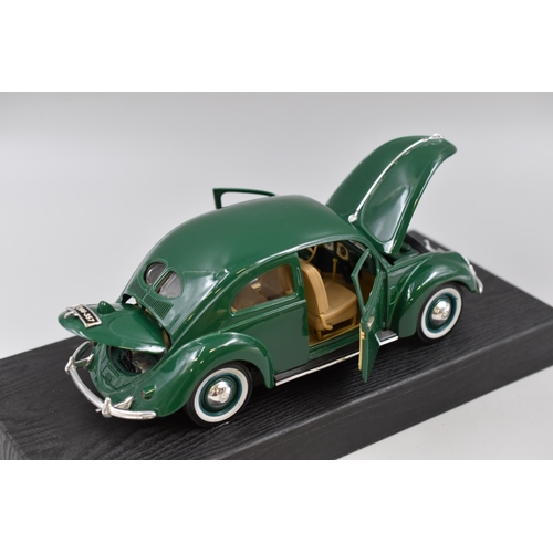 133 - Collectible Maisto Die-Cast Model 1951 Volkswagon Beetle in Green, Complete With Display Plinth, Ope... 