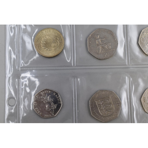 146 - Selection of 8 Collectable Coins Including Nations United For Peace, NHS, Peter Rabbit and More