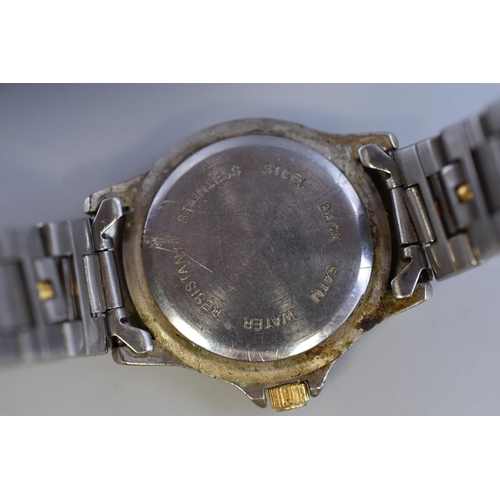 64 - A Ladies Sekonda Quartz Watch With Rotating Bezel. Working