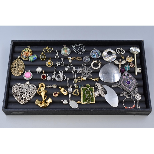 67 - A Selection of Assorted Vintage Pendants