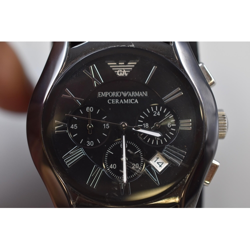 71 - An Emporio Armani Ceramica Black and Silver Tone Quartz Chronograph Watch, In Presentation Box. Work... 