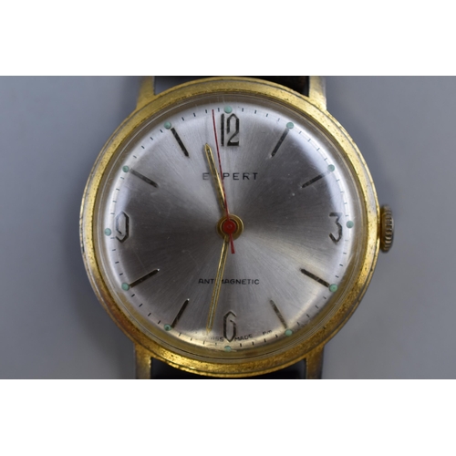 87 - An Expert Mechanical Gents Watch, With Leather Strap (Working)