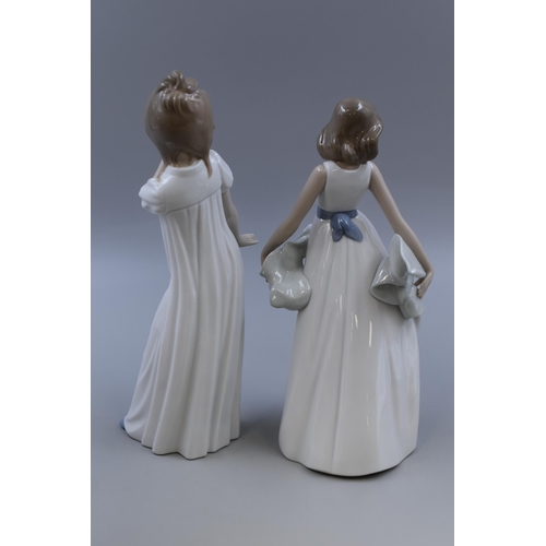 279 - Two Boxed Nao By Lladro Porcelain Figures, To Include 'Walking On Air', And Yawning Girl. Tallest Ap... 