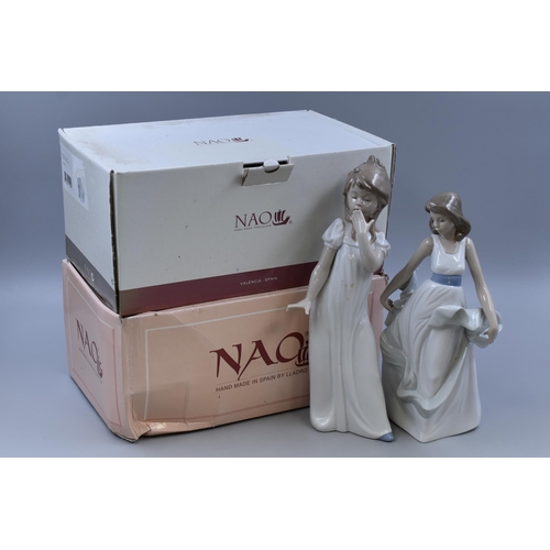 279 - Two Boxed Nao By Lladro Porcelain Figures, To Include 'Walking On Air', And Yawning Girl. Tallest Ap... 