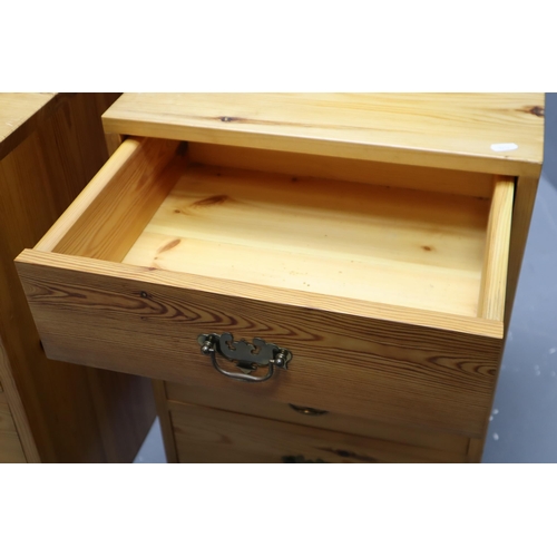 424 - A Pair of Pine Chest of Four Bedside Drawers (25