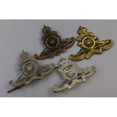 224 - Four Military Cap Badges including First Hants RGA Volunteers, Royal Artillery Volunteers, West Ridi... 