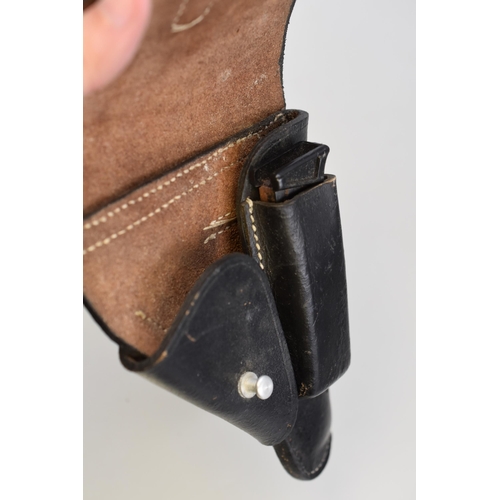 230 - A Leather Pistol Holster, With Magazine Clip