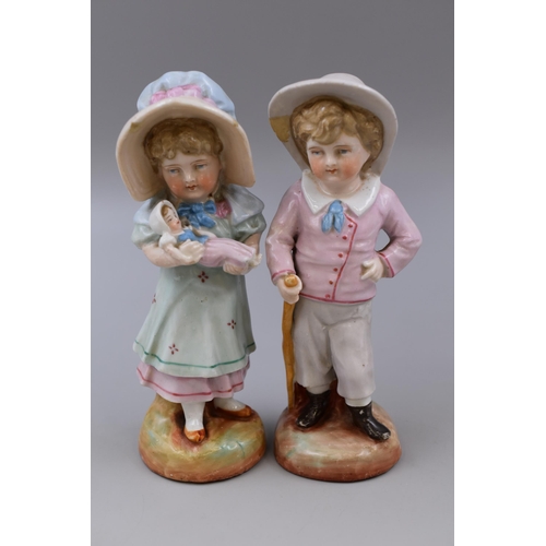 235 - Two 19th Century German Figures of Boy and Girl (7.5