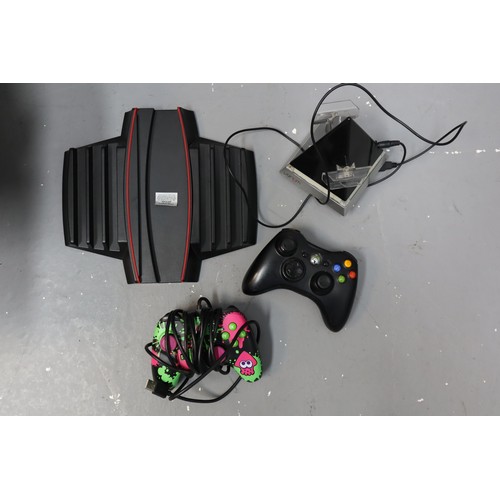 449 - Six Various Gaming Controllers and Charging Docks.