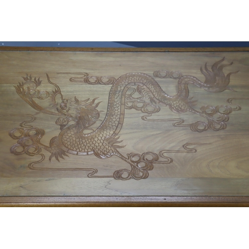 513 - A Carved Teak Chinese Dragon Glass Topped Coffee Table, Large Dragon Display To The Tabletop and Dra... 