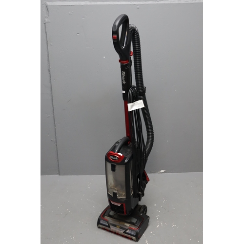 549 - Shark Corded Upright Vacuum (Powers On). No Postage