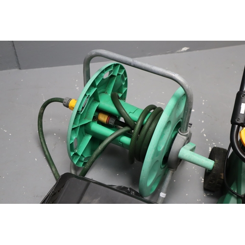 581 - Electric Lawn Mower ( Powers on when tested) with Grass Box and a Hozelock Hose Reel