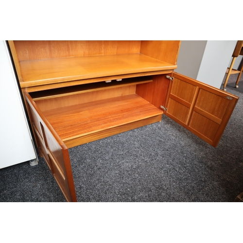 556 - Mid Century High Quality Nathan Teak One Piece Wall Unit Consisting of One Shelf Display over a Lock... 