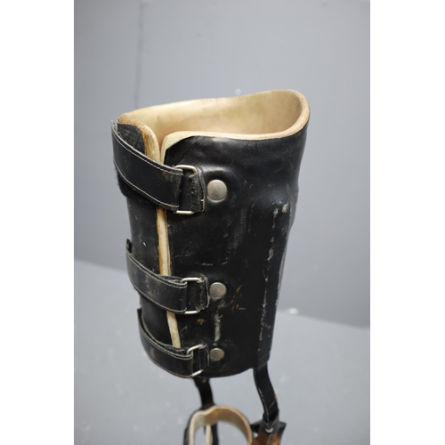 378 - A Vintage Leg Calliper With Flame Shoe And Leather Straps