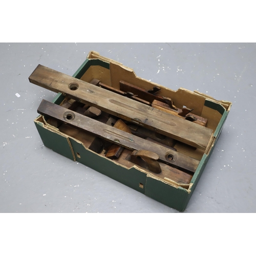 721 - Box Full of Old Wooden Planes and Two Wooden Spirit Levels