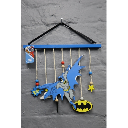 699 - Four Boxes to Include 12 Boxed Superman Children's Hanging Wall Art (WB133) and 12 Boxed Batman Chil... 