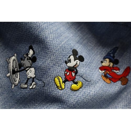 701 - Two Bags To Include Mickey Mouse, And Dinosaur Bag on Wheels