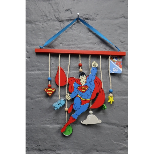 699 - Four Boxes to Include 12 Boxed Superman Children's Hanging Wall Art (WB133) and 12 Boxed Batman Chil... 