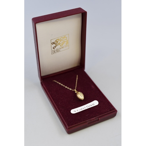 14 - A 9ct Gold American Football Pendant Necklace, In Presentation Box. Tangled Chain