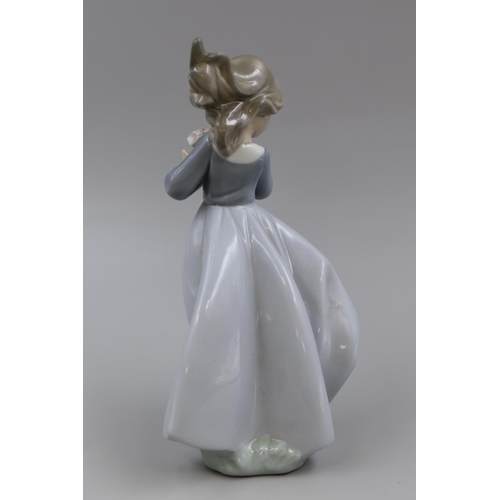 272 - NAO By LLadro Porcelain Figurine 'Windy Afternoon' approx 19c in Height, Unboxed