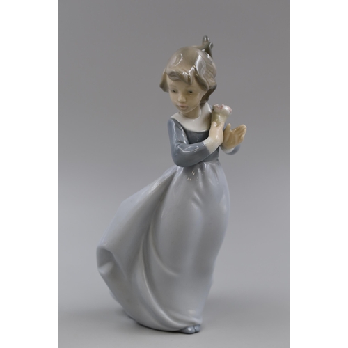 272 - NAO By LLadro Porcelain Figurine 'Windy Afternoon' approx 19c in Height, Unboxed