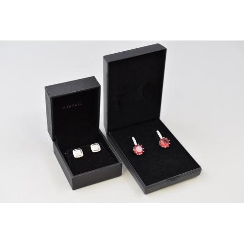 27 - Two Pairs of Silver 925 Stud Earrings