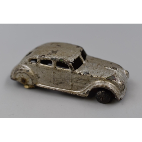 295 - Three Vintage Pre-War Metal Models to Include, Taylor & Barrett Trolley Bus, Dinky Caravan and D... 