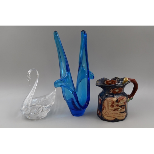 216 - Victoria Pottery Hand Painted Jug, Heavy Crystal Swan and a Blue Freeform Vase (Tallest 13