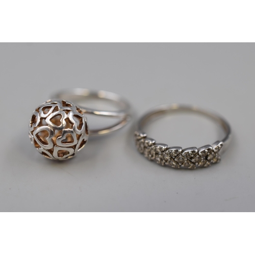 62 - Two 925. Silver Rings To Include Loveheart Ball and Clear Stoned. Sizes N and U