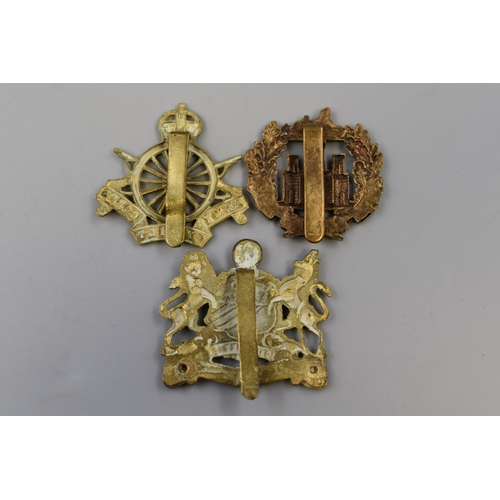 229 - Three Military Cap Badges To Include Manchester Regiment, Essex Regiment, And Army Cyclist Corps