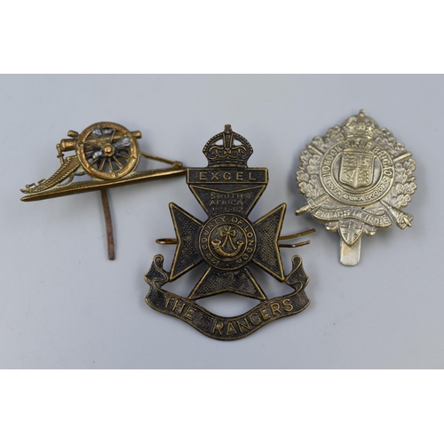 230 - Three Military Cap Badges To Include Royal Artillery, Twelfth Battalion London Rangers, And London R... 