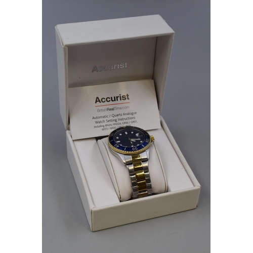 87 - An Accurist Gold and Silver Tone Divers Quartz Watch With Blue Dial and Presentation Box. Working