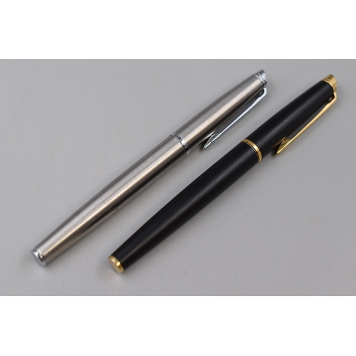 255 - Two Waterman Ball Point Pens To Include Brushed Metal, and Gold and Black Tone