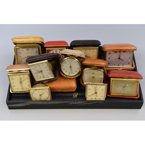 115 - A Selection of Vintage Travel Clocks To Include Europa, Smiths, Estyma, And More. Spares or Repairs