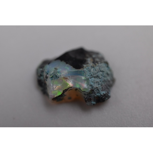 120 - Natural Boulder Opal Chip (.84 grams) Complete with Case