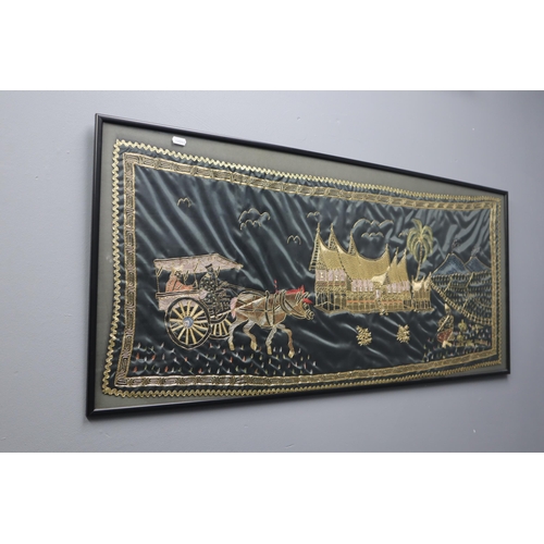 378 - A Framed and Glazed Oriental Embroidered Silk Artpiece Depicting Horse Drawn Carriage and Flute Play... 