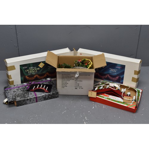 758 - Large Collection of Boxed Christmas Decorations to include Three Light-Up Candle Arches, Two Light-U... 