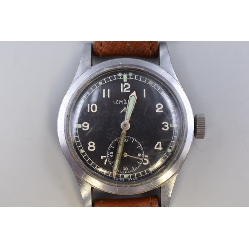 2 - A WWII Military Issue Lemania 'Dirty Dozen' Mechanical Black Dial Watch With Broad Military Arrow an... 