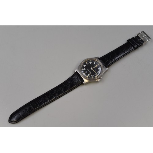 1 - A Cabot Watch Company (CWC) British Military Issue Quartz Watch With Black Dial and Leather Strap. N... 