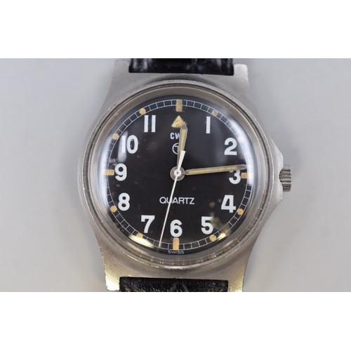 1 - A Cabot Watch Company (CWC) British Military Issue Quartz Watch With Black Dial and Leather Strap. N... 