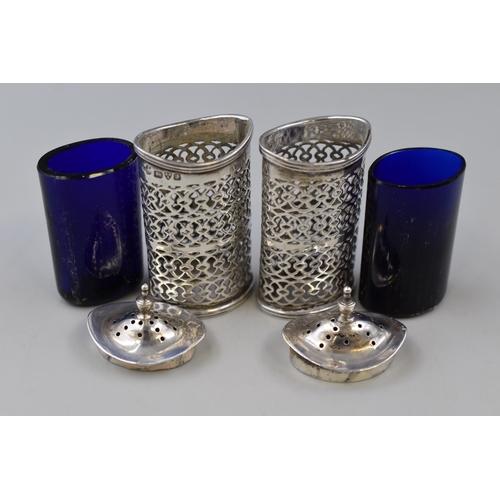 13 - Pair of Hallmarked Chester Silver Pepper Pots with Cobalt Blue Glass Liners